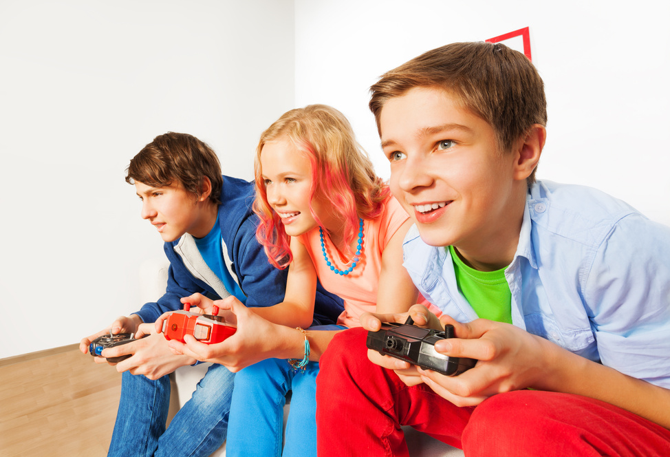 Three Kids Playing a Video Game