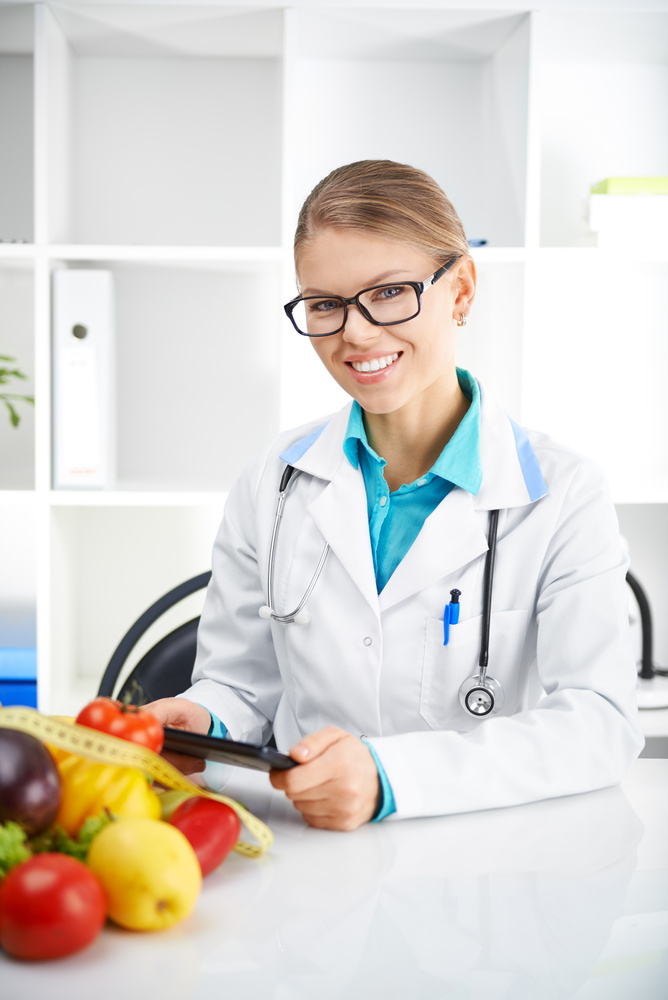 Doctor nutritionist with tablet pc
